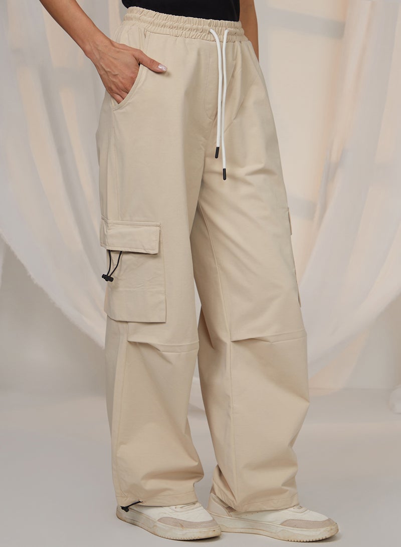 PINACOLADA Women's Beige Solid Cargo Parachute Trousers For Casual Wear | Mid-Rise | 4 Pockets | Drawstring Closure | Cargo Pants Designed With Comfortable Fit For Woman & Girls - Image 3